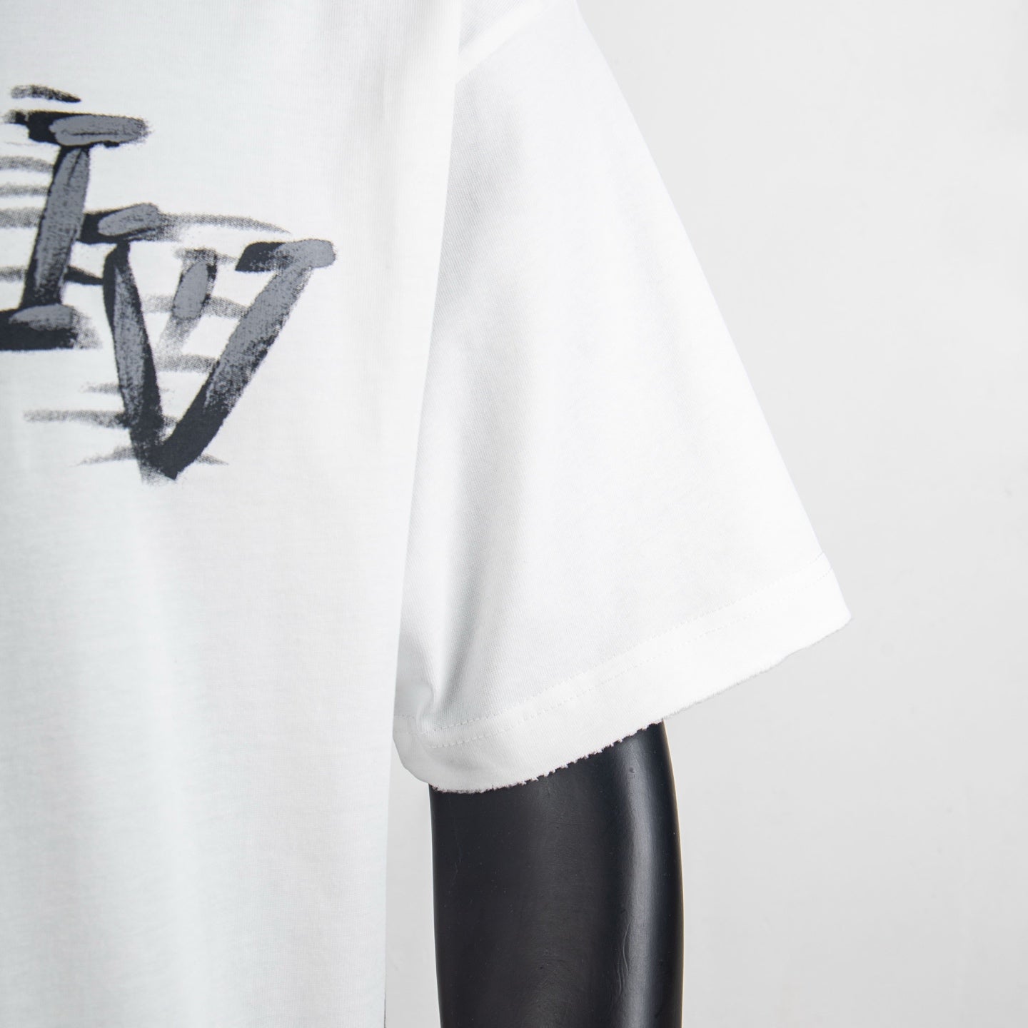 White T-shirt short sleeve and side drape with partial front logo