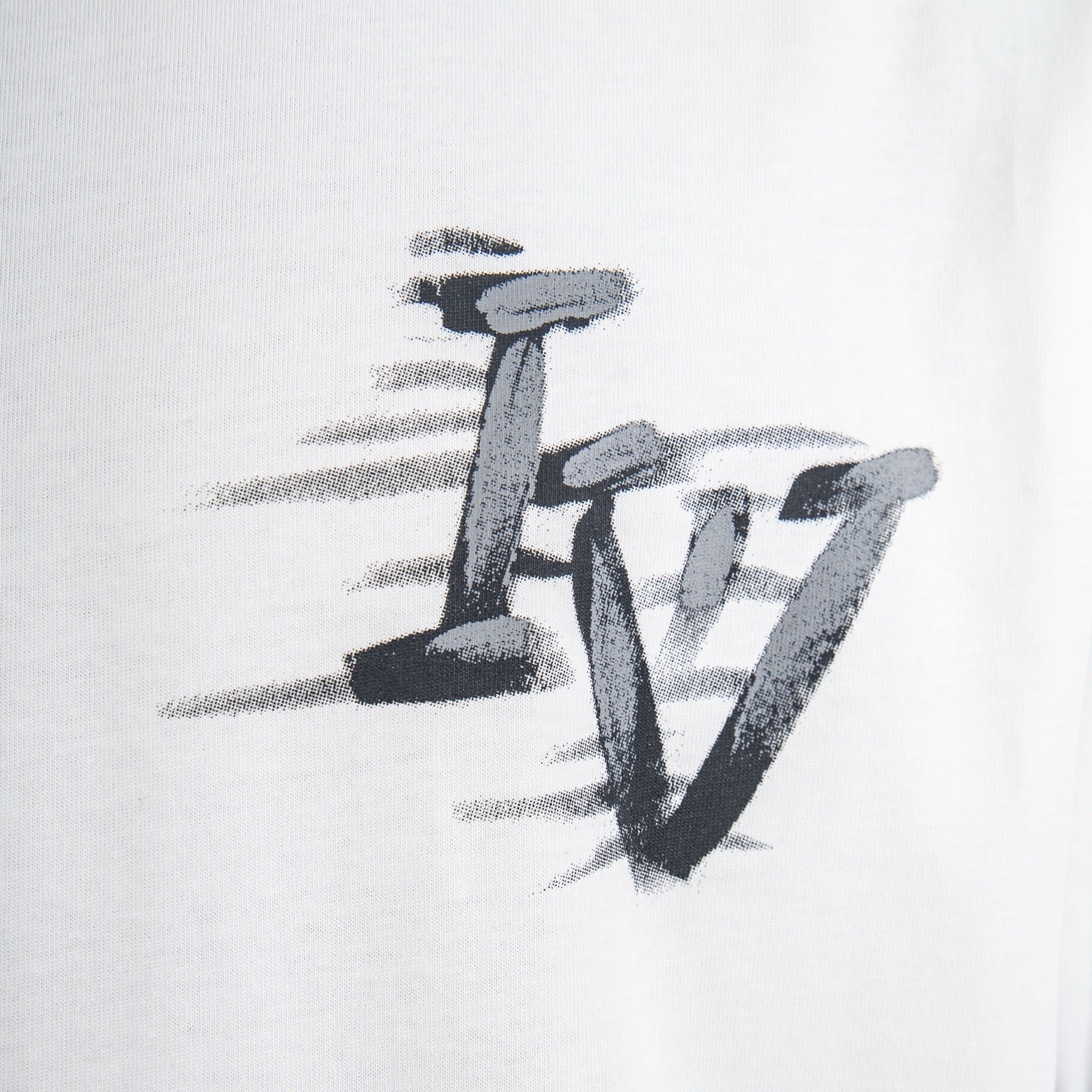 White T-shirt with stylized black and gray logo graphic