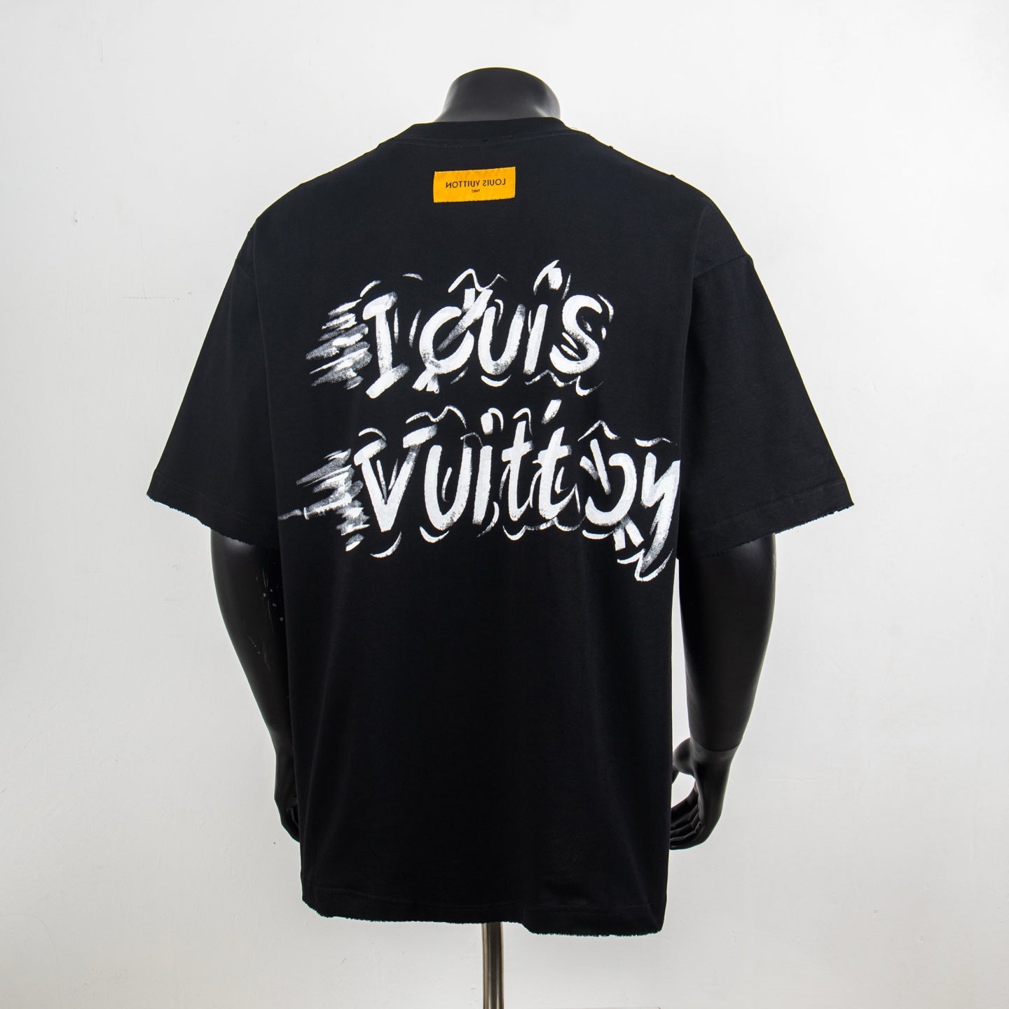 Louis Vuitton T-shirt, black, back view with large white script graphic