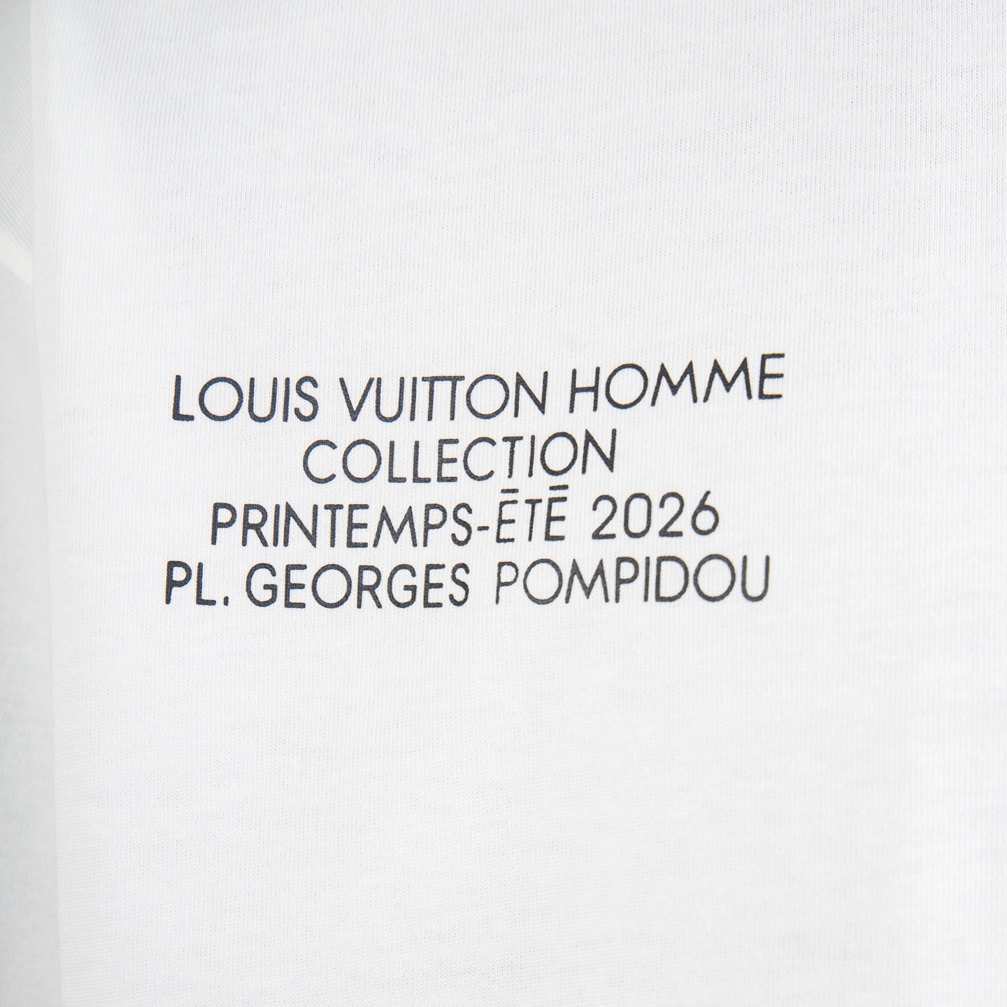 White T-shirt with Louis Vuitton Homme collection text print