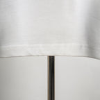 White T-shirt hem with double-stitched seam detail