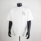 White T-shirt with blue “LV SINCE 1854” graphic on the front