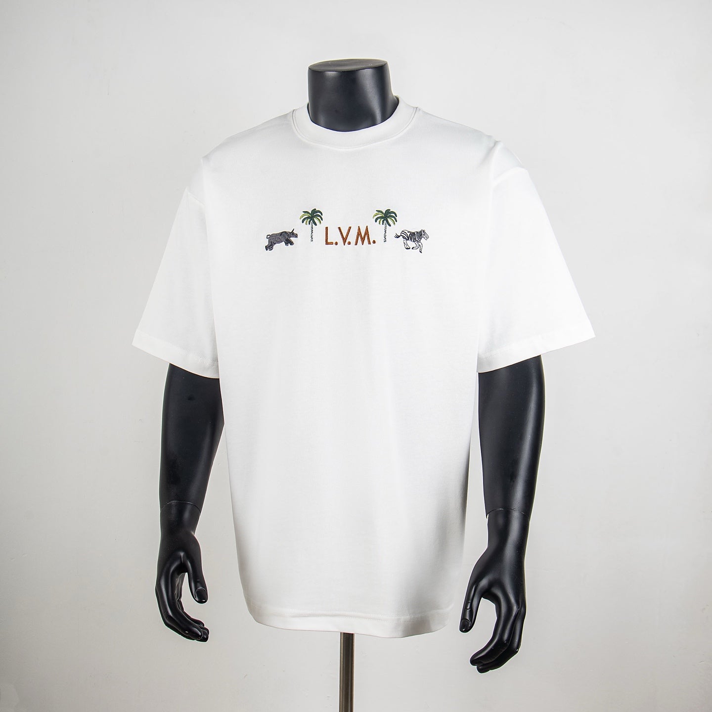 White T-shirt with chest animal graphic and L.V.M. print