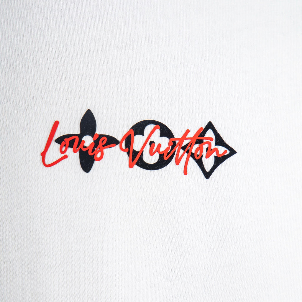 White Louis Vuitton T-shirt close-up of red and black logo script