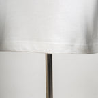 Louis Vuitton T-shirt hem close-up with clean stitched bottom edge