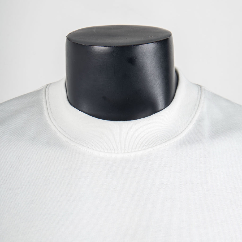 White Louis Vuitton T-shirt close-up of crew neckline and collar seam