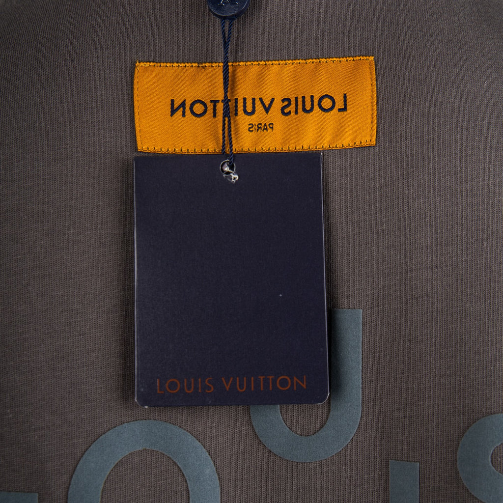 Louis Vuitton short-sleeve t-shirt back label with hanging tag and blue logo on dark gray