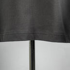 Louis Vuitton short-sleeve t-shirt hem and stitching detail on dark gray