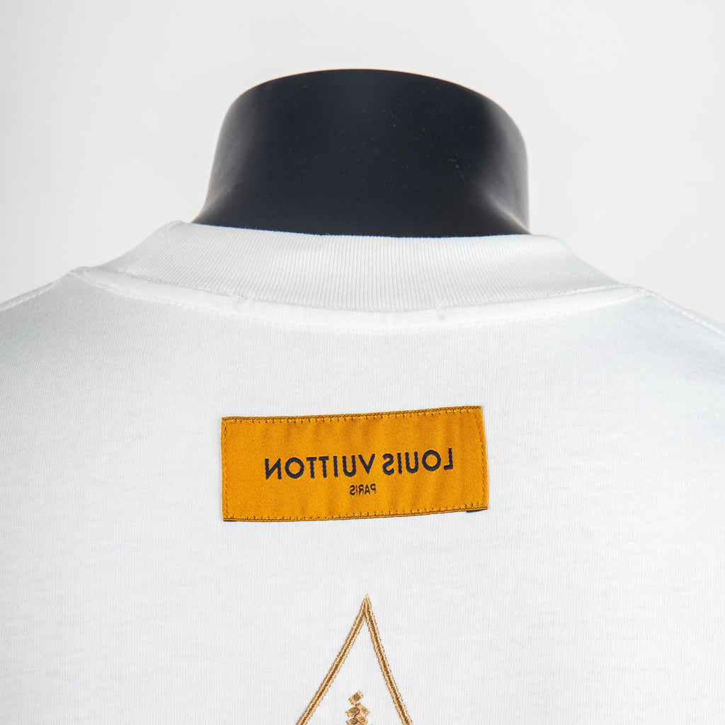 White short-sleeve T-shirt with embroidered gold diamond motif and neck tag