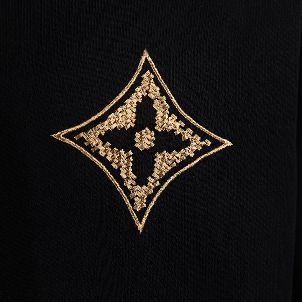 Louis Vuitton black T-shirt with embroidered gold diamond emblem