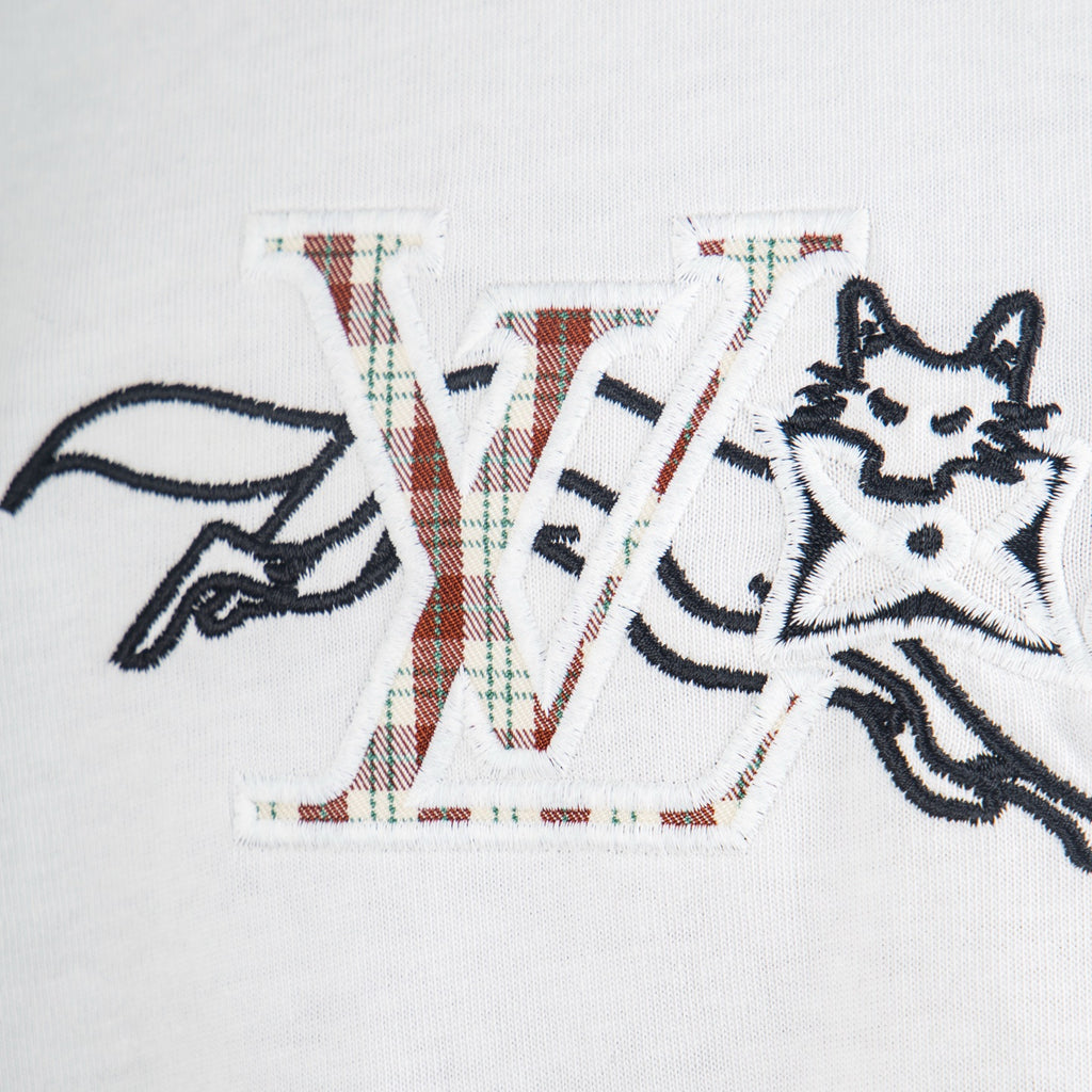 White T-shirt front close-up of 'LV' graphic and animal figure