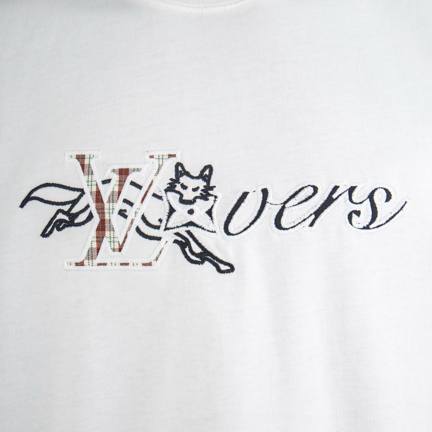 White T-shirt front with large colorful 'ivers' graphic and figure