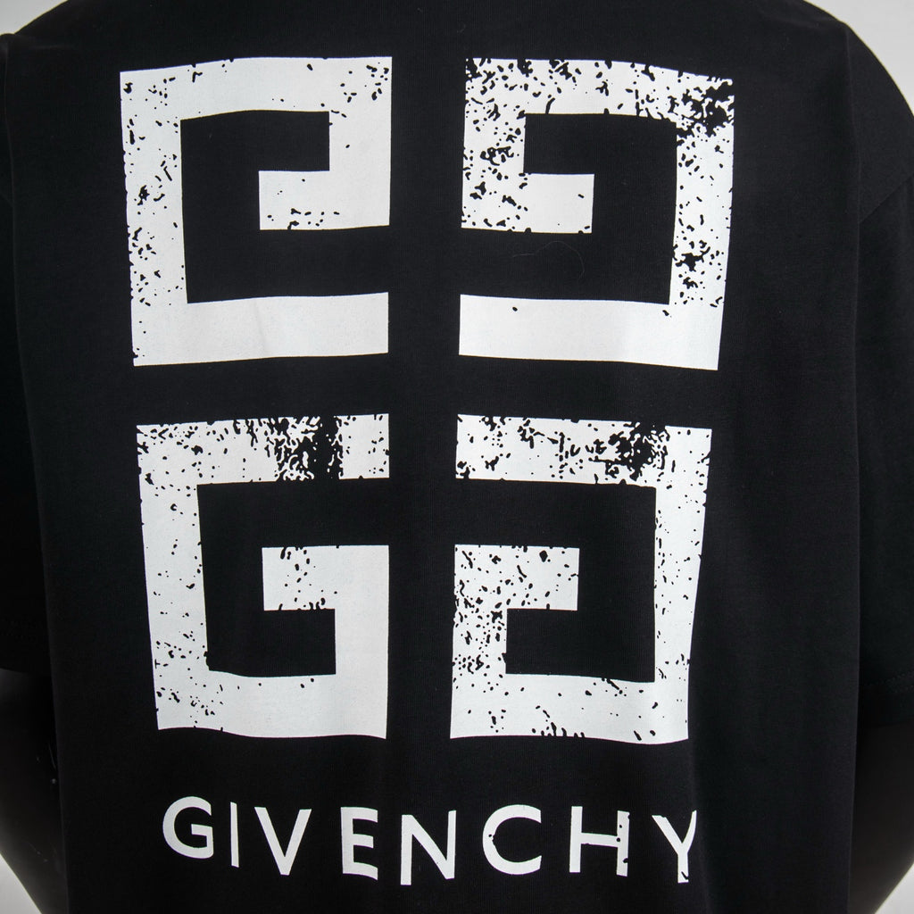 Black T-shirt back with large white distressed square graphic