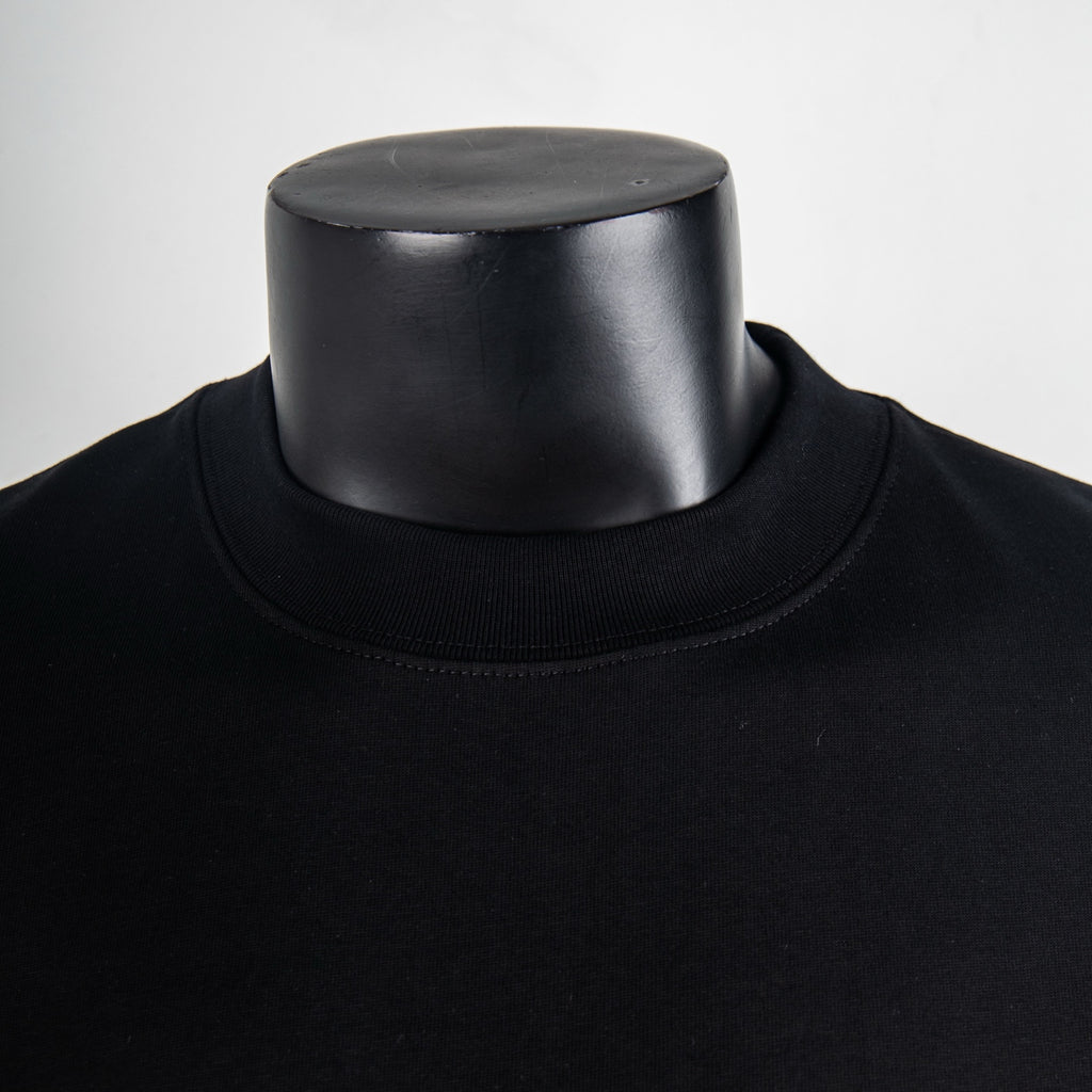 Black crew-neck T-shirt collar with ribbed neckline detail