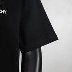 Black T-shirt sleeve and hem close-up with neat stitching