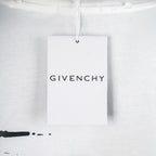 White T-shirt with attached Givenchy brand hang tag