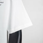 White T-shirt hem and short sleeves with slightly frayed edge