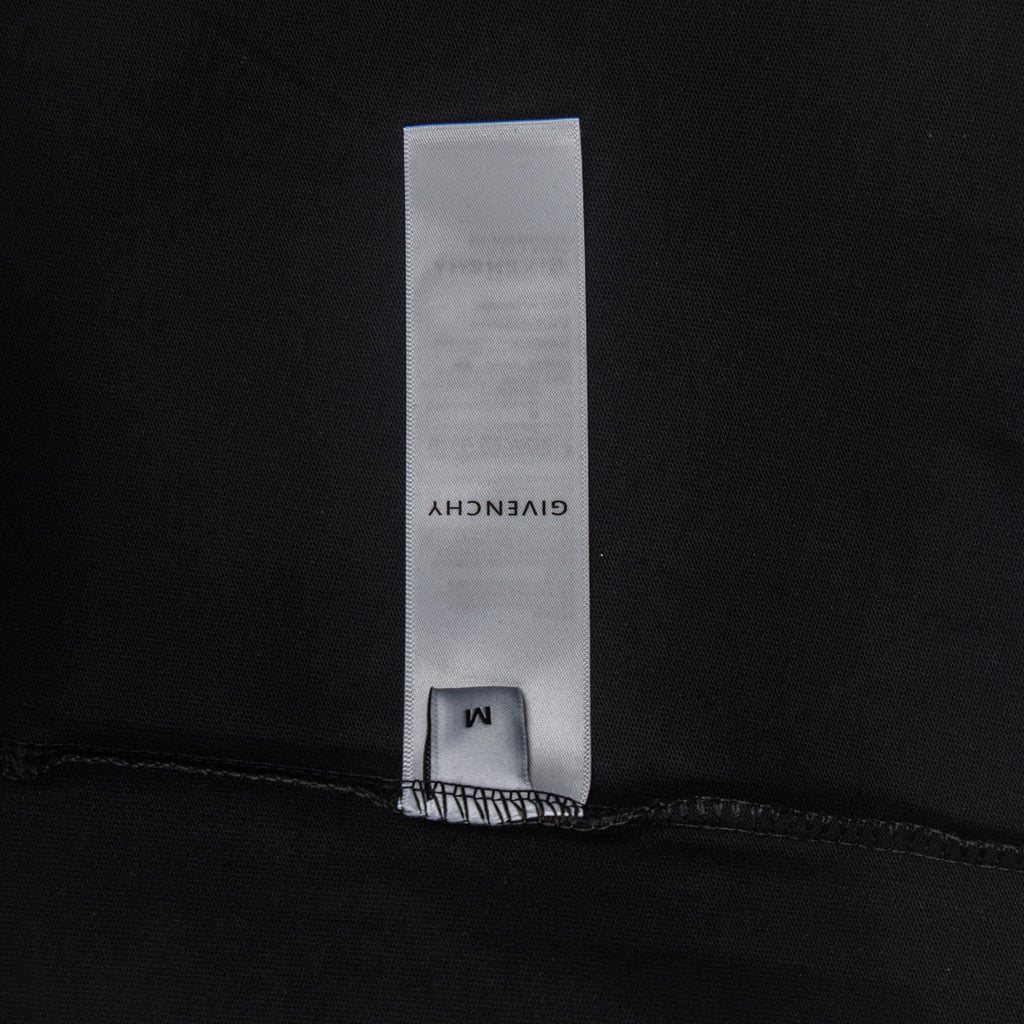 Black T-shirt with inner care and size label
