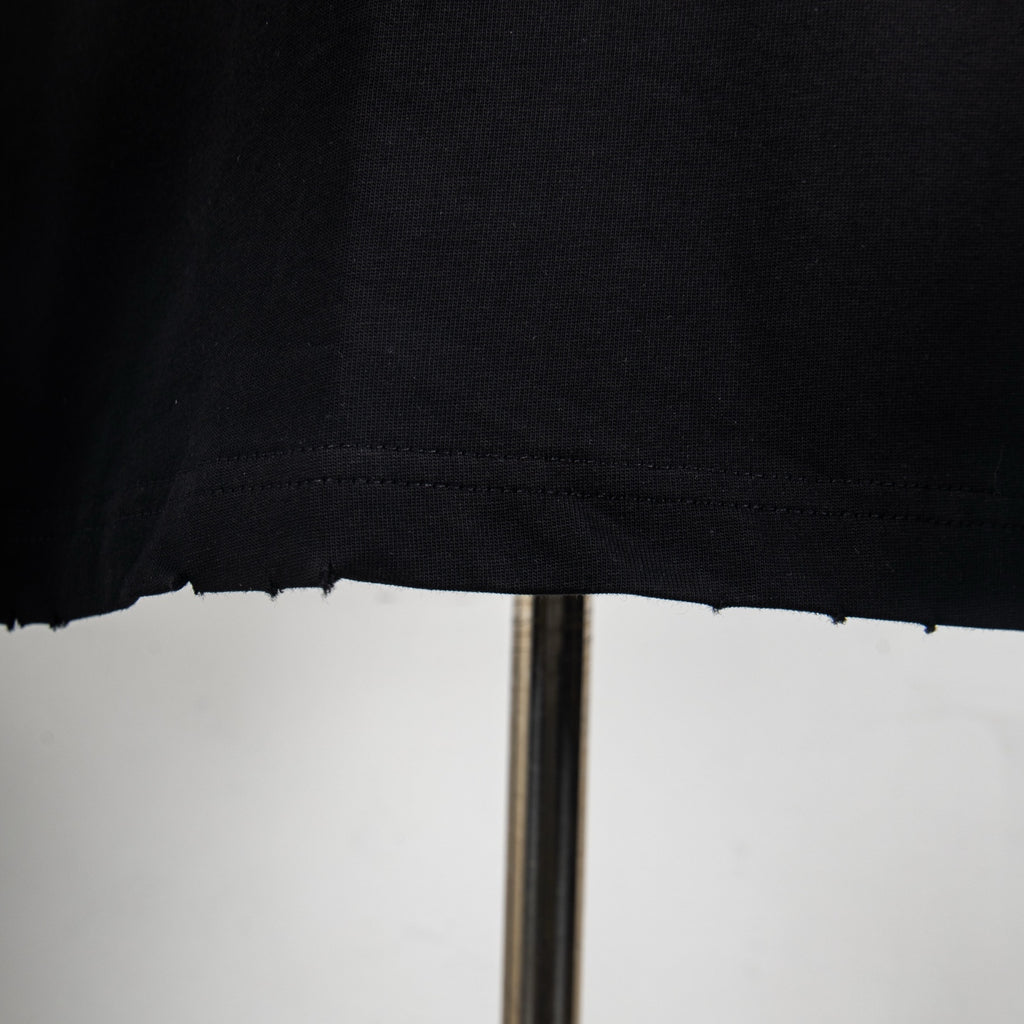 Black Givenchy T-shirt bottom hem detail
