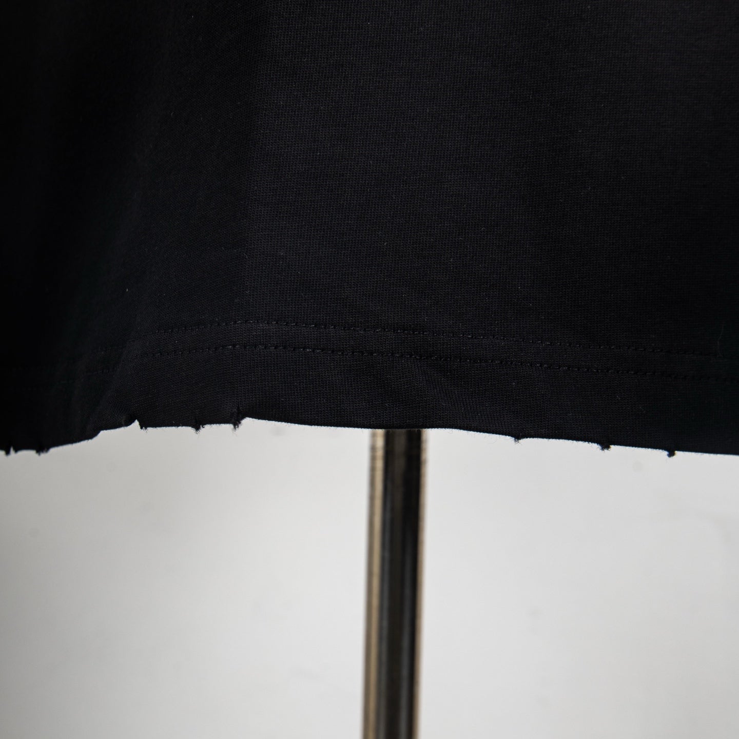 Black Givenchy T-shirt bottom hem detail