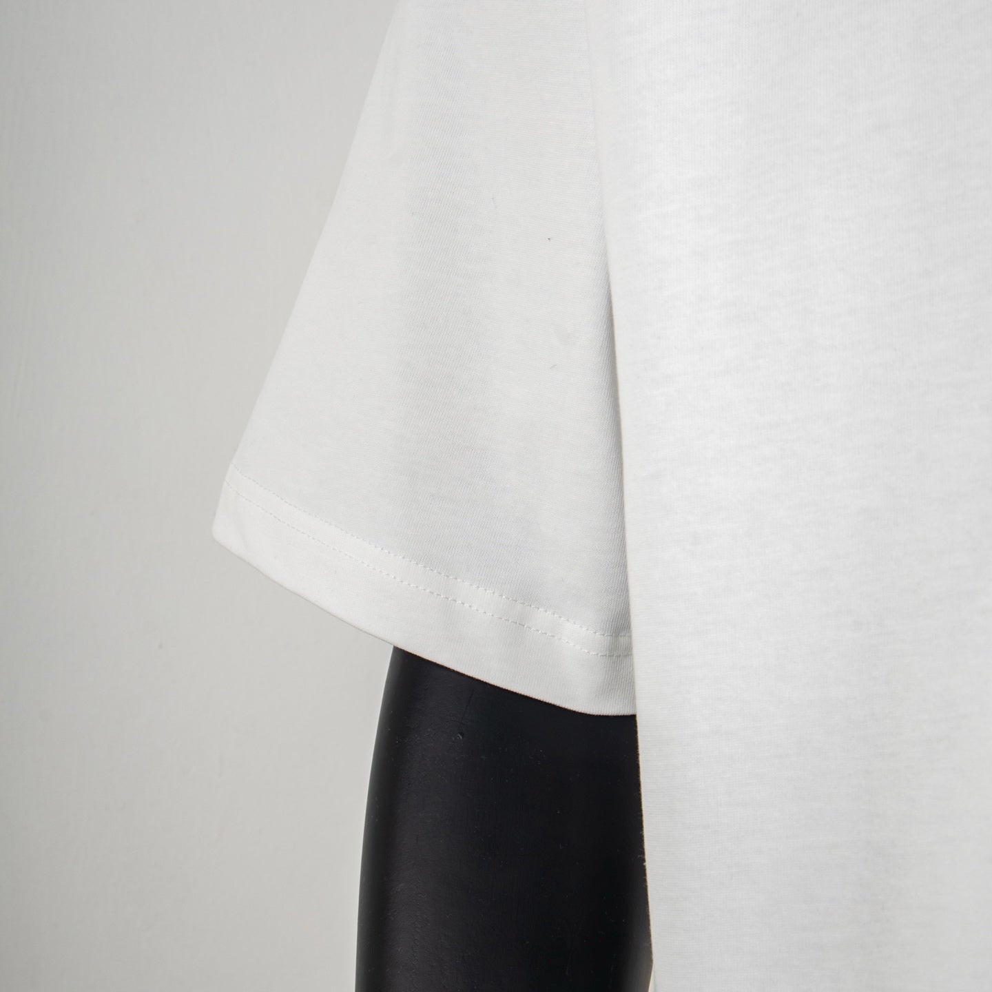 Givenchy white T-shirt side hem and short sleeve seam detail
