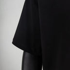 Black short-sleeve T-shirt with straight hem, side view