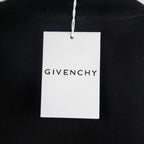 Givenchy black T-shirt with hanging tag labeled GIVENCHY