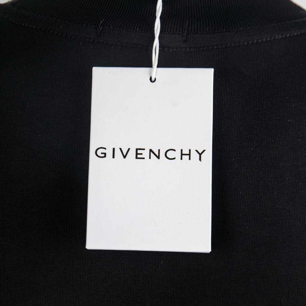 Black T-shirt with hanging GIVENCHY brand label