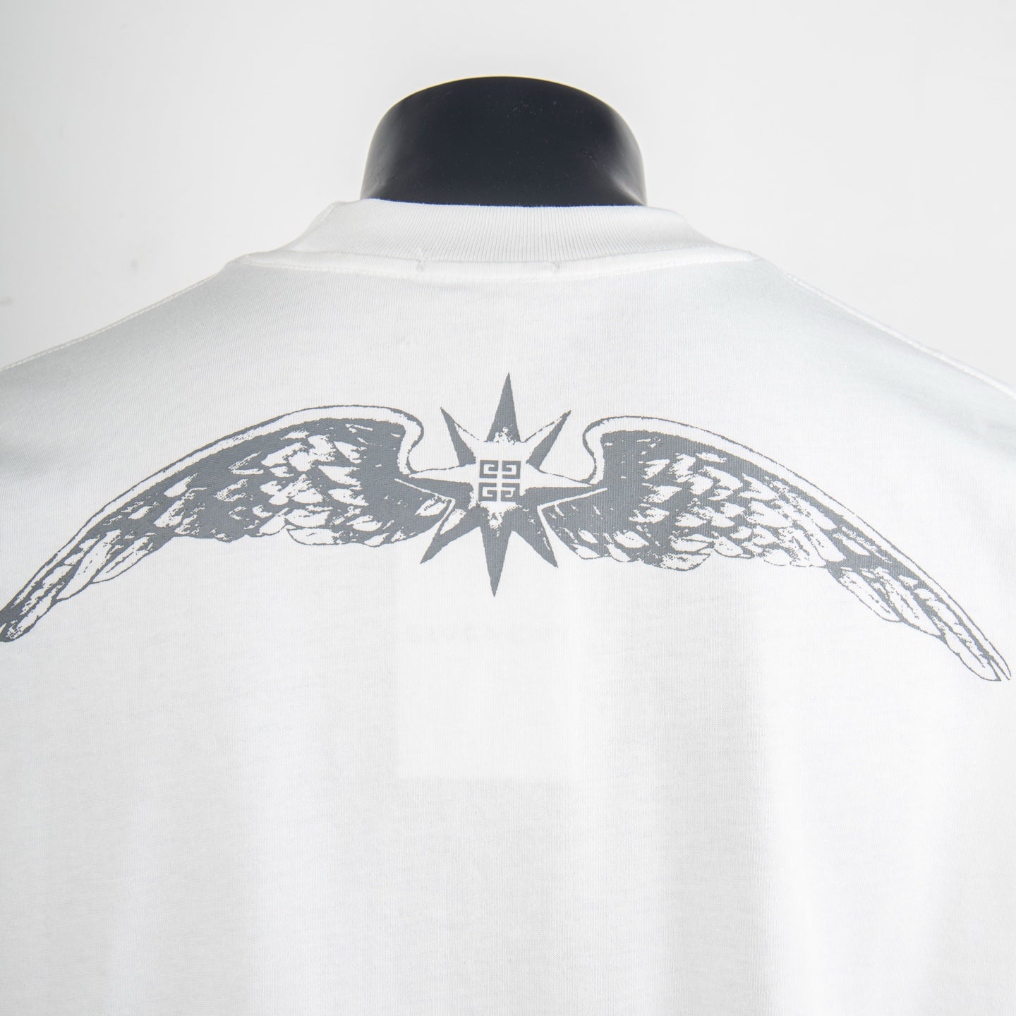 White T-shirt with centered back winged star graphic