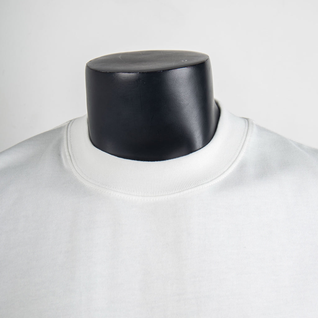 White crewneck T-shirt neckline close-up