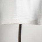 White T-shirt hem with stitched seam detail