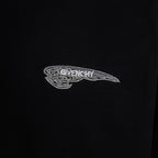 Embroidered Givenchy emblem on black T-shirt chest