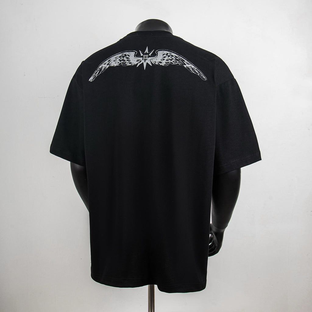 Givenchy black crewneck T-shirt with large back graphic and crown emblem.