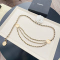 Gold-tone Chanel logo chain belt with round medallion charms