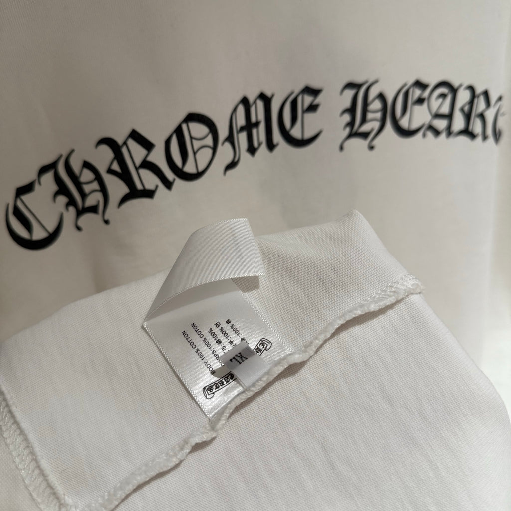 White short-sleeve T-shirt tag inside collar with large logo text