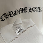 White short-sleeve T-shirt tag inside collar with large logo text