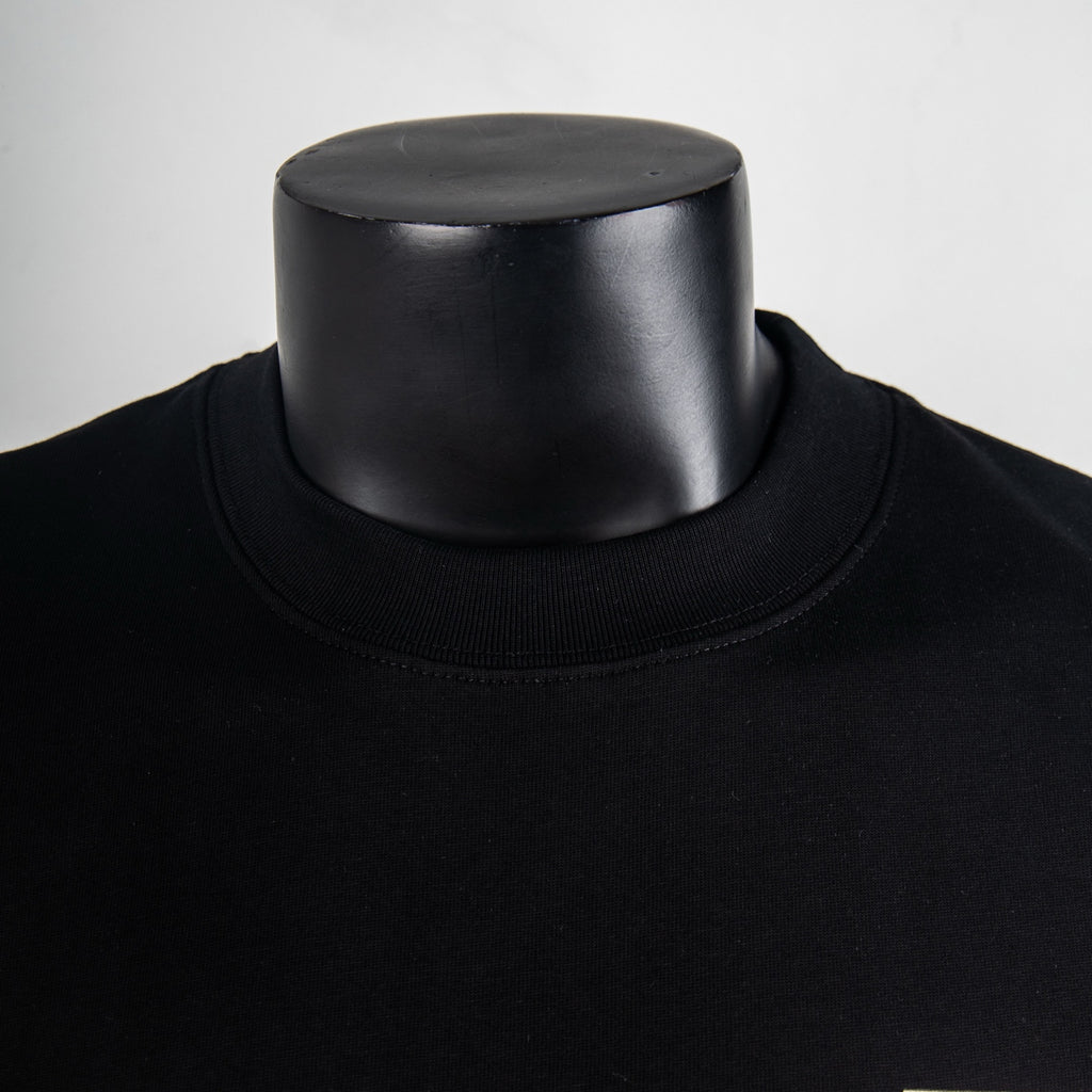 Black crewneck T-shirt collar and neckline seam