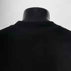 Black T-shirt back yoke with raised collar seam