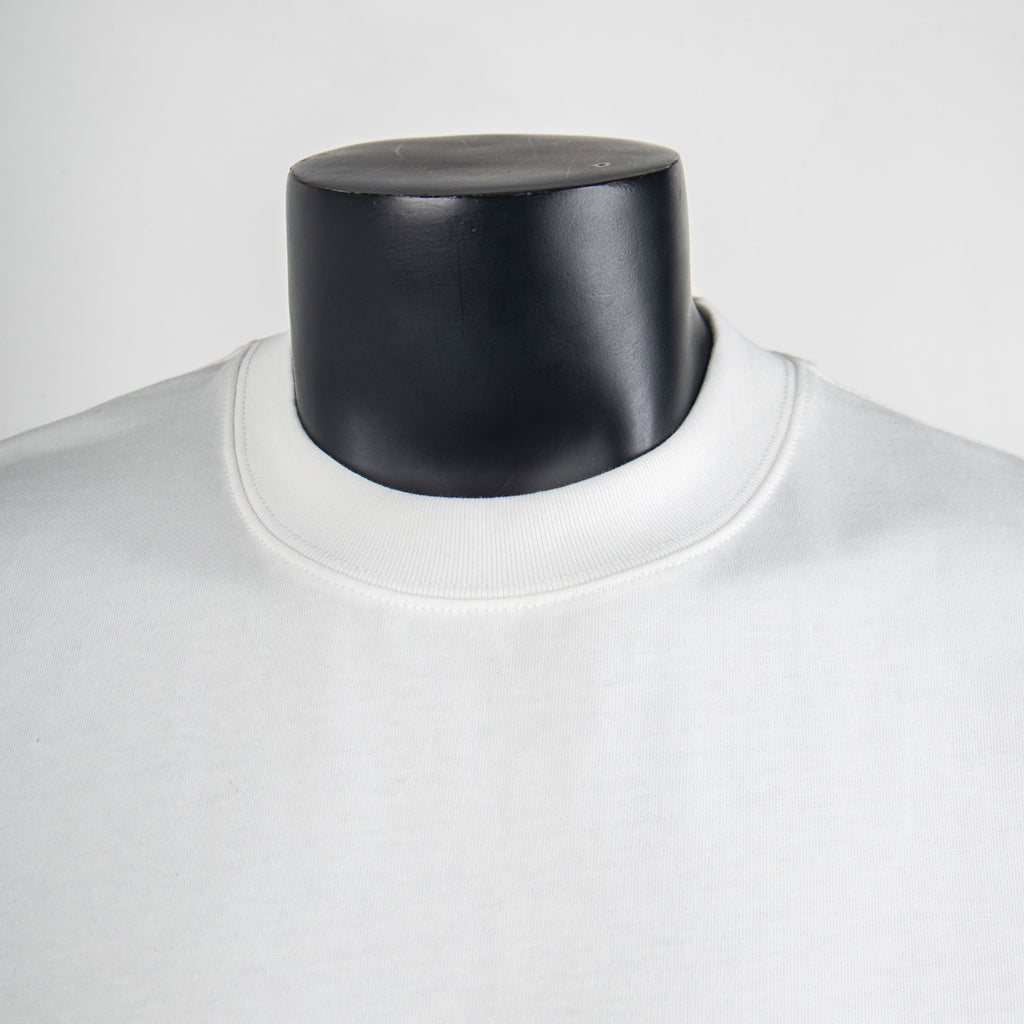 White Dior T-shirt neckline close-up