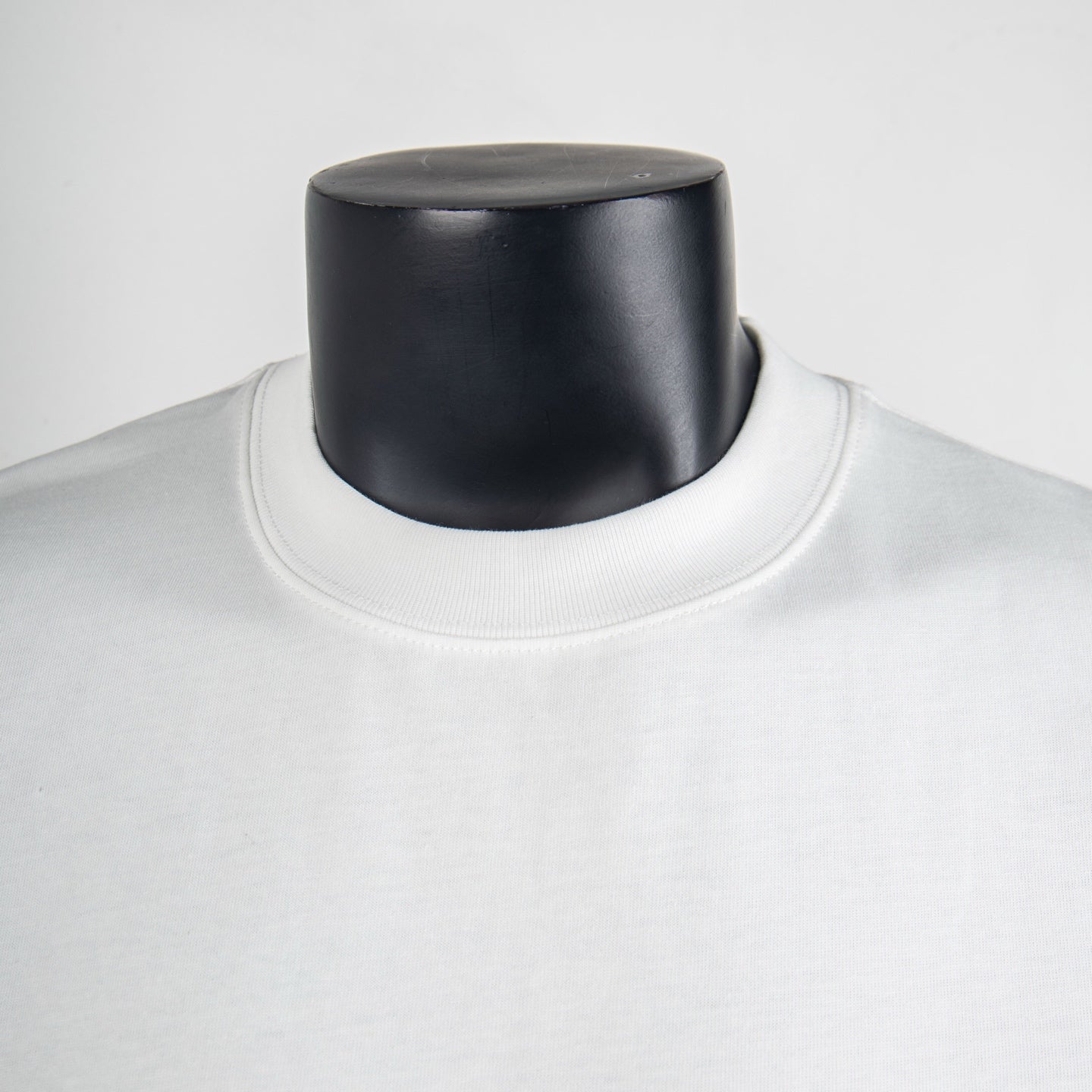 White Dior T-shirt neckline close-up