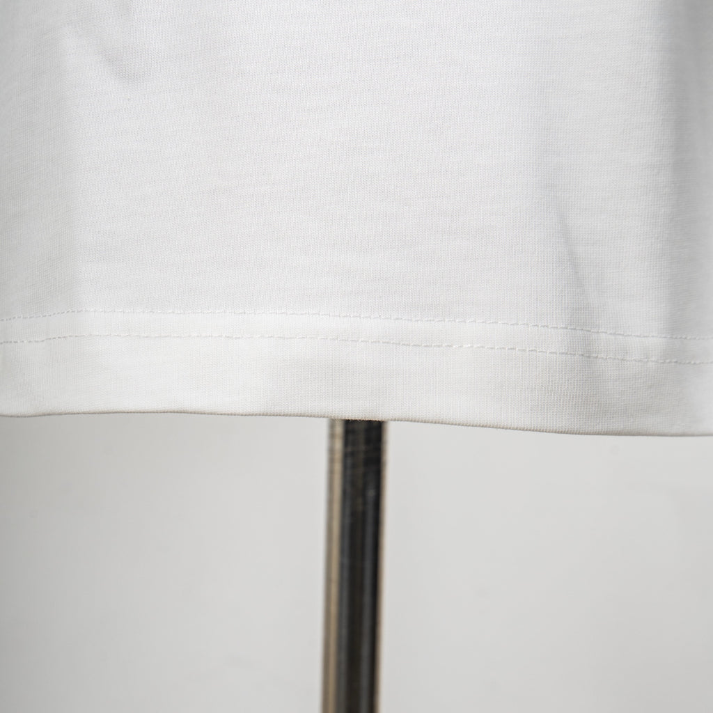 White Dior T-shirt hem stitching detail