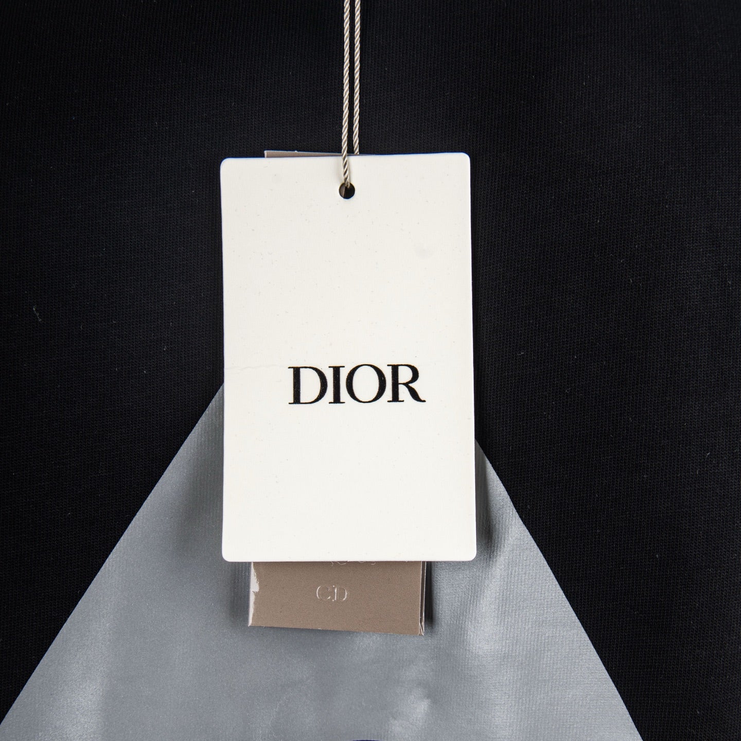 Black T-shirt with Dior hang tag
