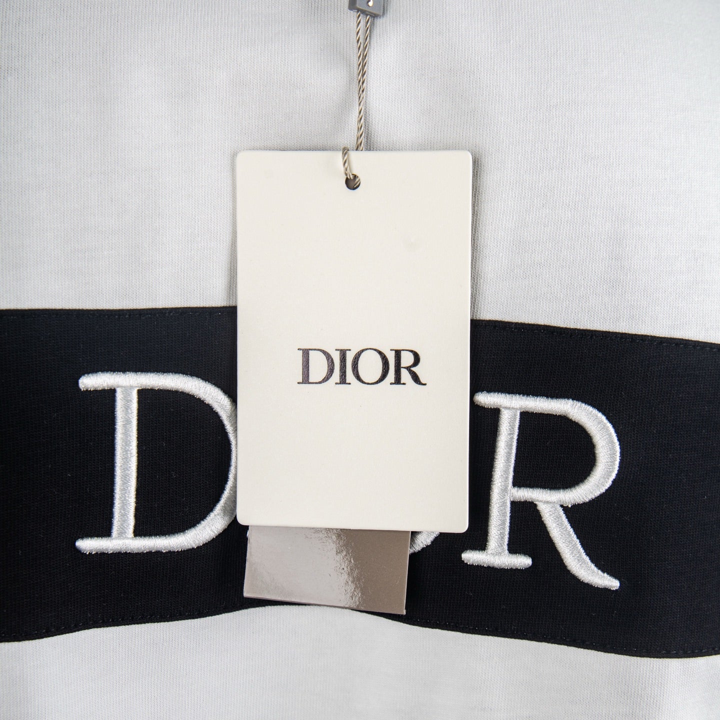White T-shirt with hanging Dior logo tag