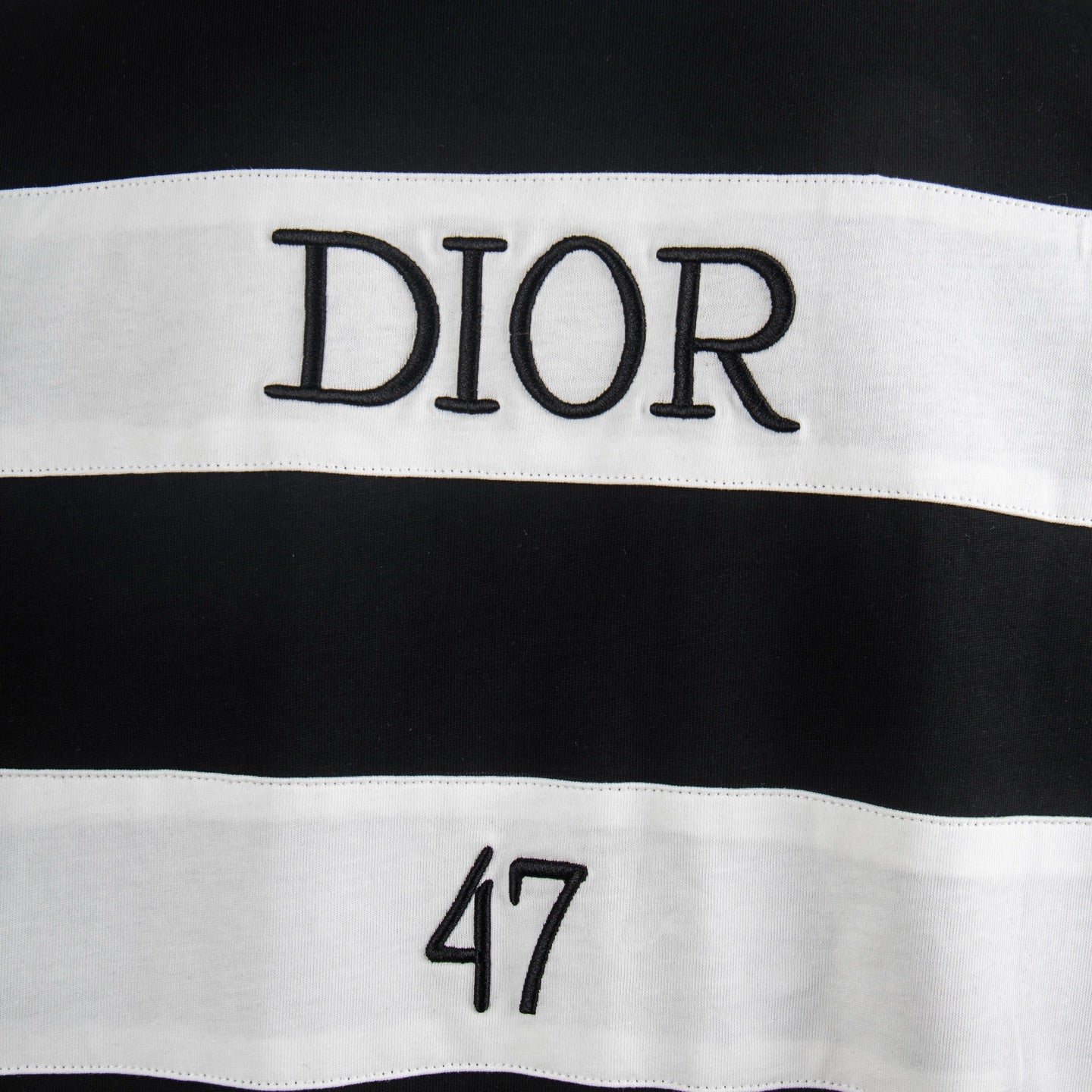 Black T-shirt with white DIOR strap and 47 print