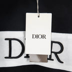 Black-and-white T-shirt with DIOR tag on neckline