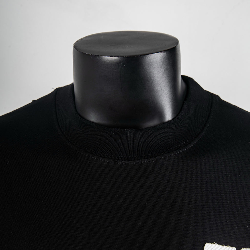 Black mock-neck T-shirt with ribbed collar and smooth jersey neckline