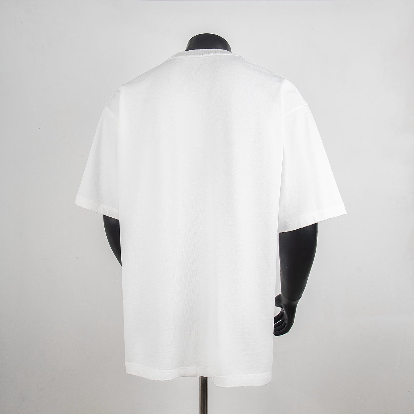 White short-sleeve T-shirt, back view on mannequin