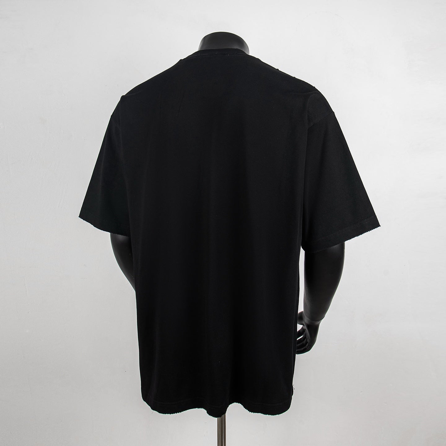 Black crewneck short-sleeve T-shirt back view, plain