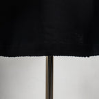 Black T-shirt hem with stitched edge
