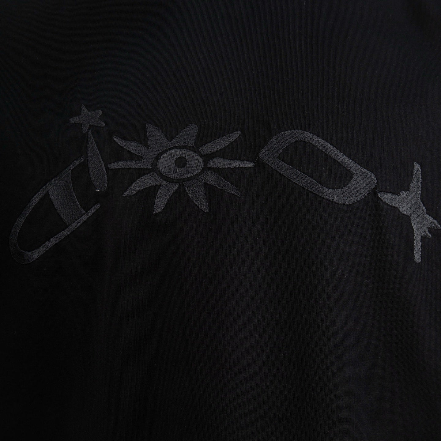 Black short-sleeve T-shirt with large logo print on chest